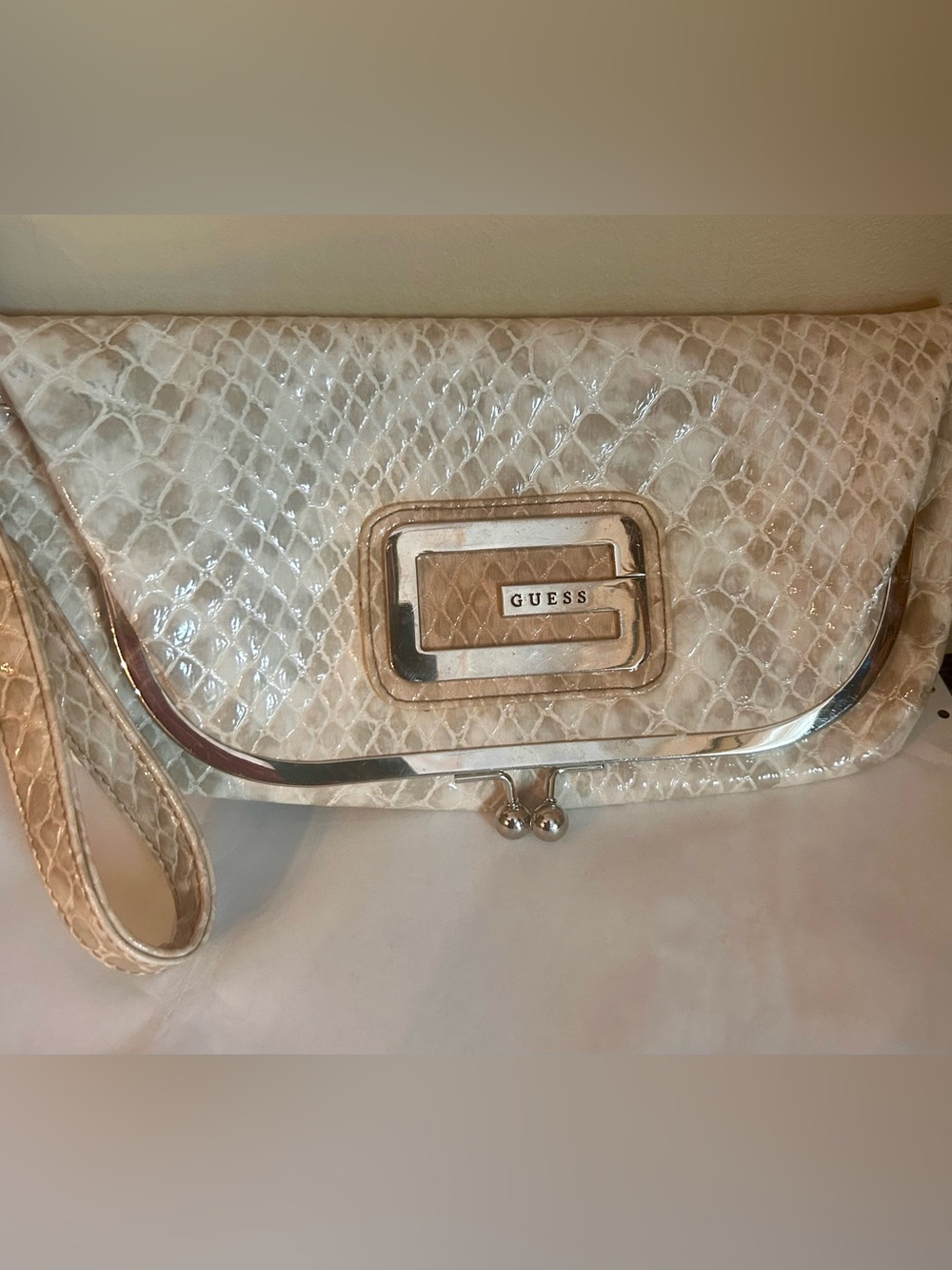 GUESS Snake-Embossed Wristlet Clutch with Metal Logo
